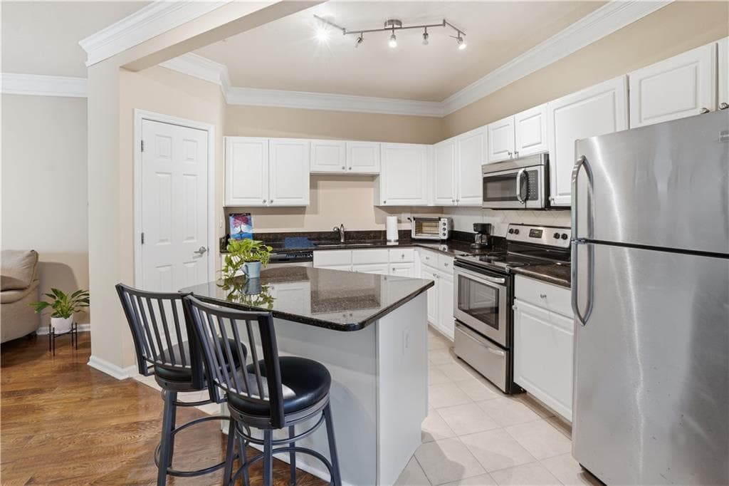 1 bedroom, 1 bathroom, 815 sq ft condominium for sale at 1850 Cotillion Drive 3222, Atlanta, GA 30338 — photo 10