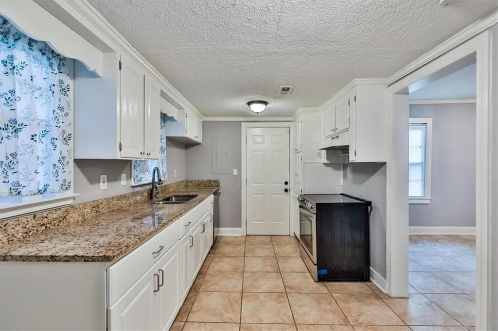 3 bedroom, 2 bathroom, 1,920 sq ft single family residence for sale at 6320 Temple Street, Lithia Springs, GA 30122 — photo 9