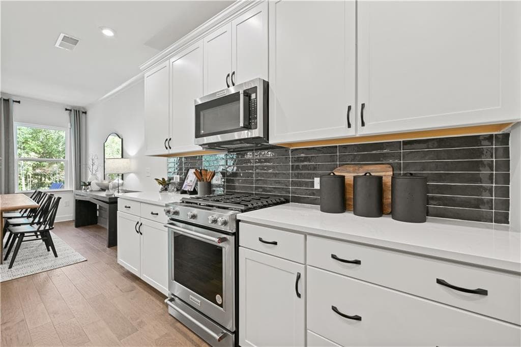 5 bedroom, 3 bathroom, 2,622 sq ft single family residence under contract at 6143 Marigold Way, Atlanta, GA 30349 — photo 10