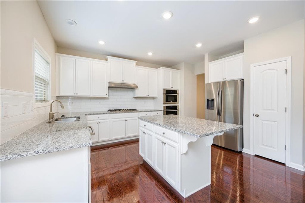3 bedroom, 4 bathroom, 2,338 sq ft townhouse for sale at 620 Sunset Park Drive, Suwanee, GA 30024 — photo 10