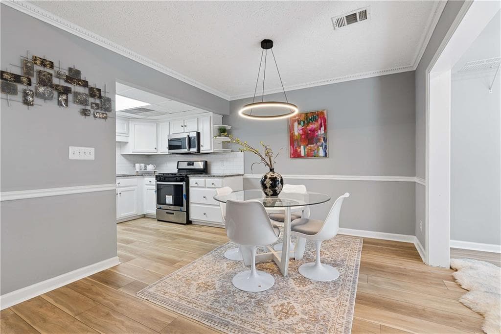 3 bedroom, 2 bathroom, 1,241 sq ft condominium for sale at 1728 Cotton Patch Lane, Alpharetta, GA 30004 — photo 2