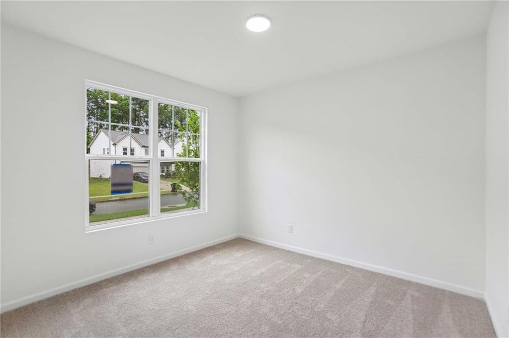 5 bedroom, 3 bathroom, 2,801 sq ft single family residence for sale at 5360 Heron Bay Boulevard, Locust Grove, GA 30248 — photo 5