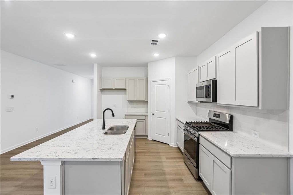5 bedroom, 3 bathroom, 2,801 sq ft single family residence for sale at 5360 Heron Bay Boulevard, Locust Grove, GA 30248 — photo 8