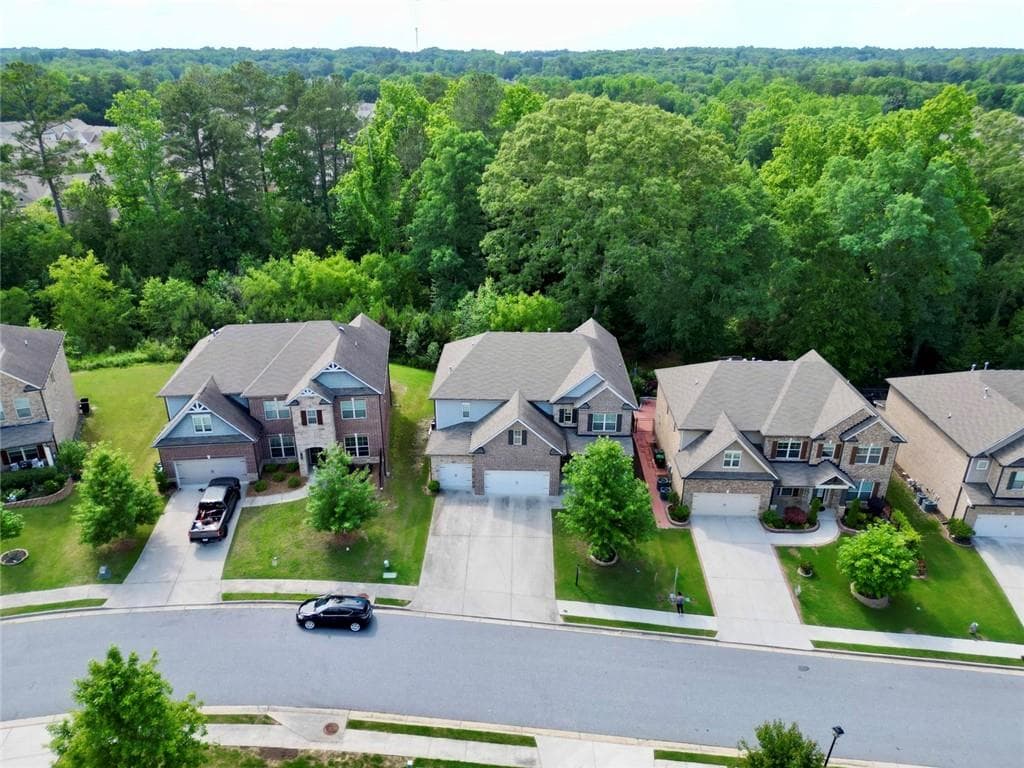 4 bedroom, 3 bathroom, 3,640 sq ft single family residence for sale at 3178 Ivy Crossing Drive, Buford, GA 30519 — photo 2