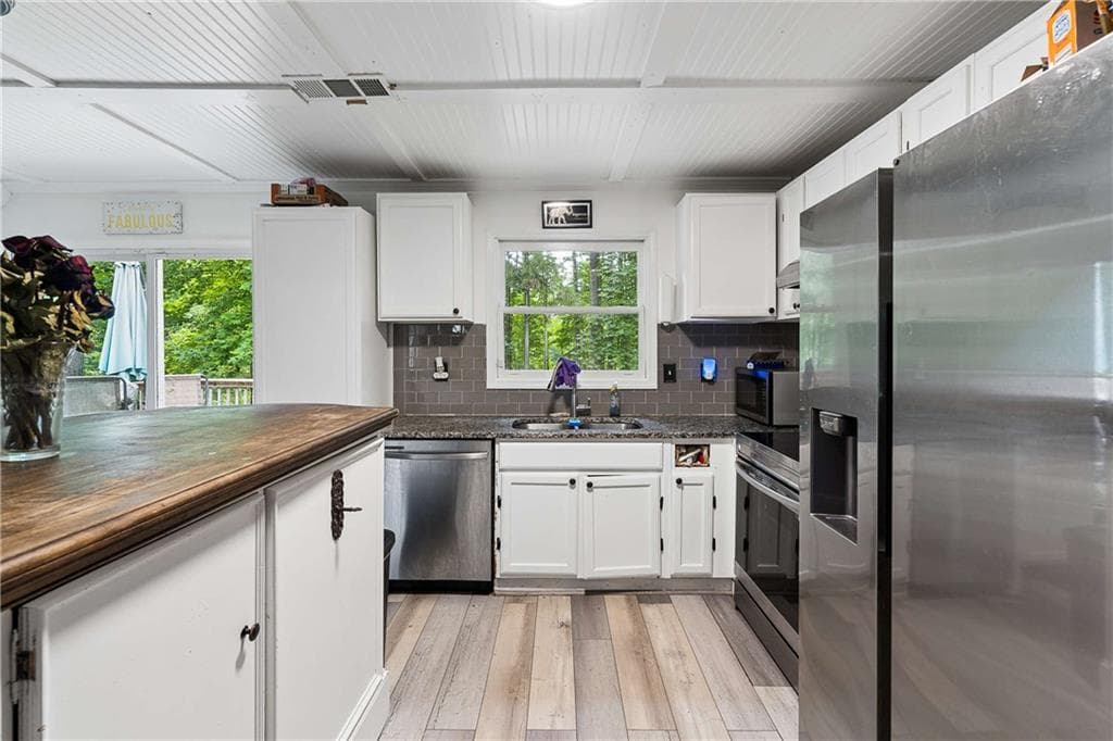 4 bedroom, 3 bathroom, 1,430 sq ft single family residence for sale at 1822 Slate Road, Ellenwood, GA 30294 — photo 7