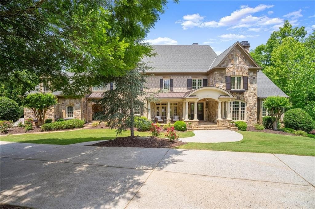 7 bedroom, 9 bathroom, 11,145 sq ft single family residence for sale at 117 Liberty Grove Pass, Alpharetta, GA 30004