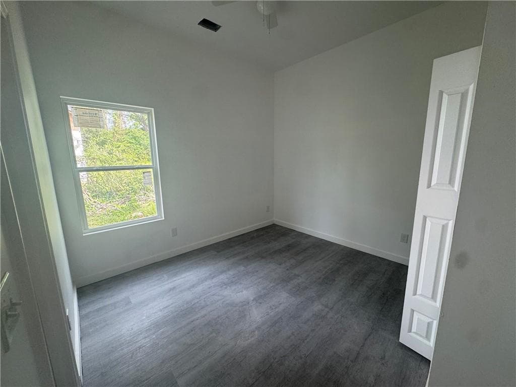 4 bedroom, 3 bathroom, 1,654 sq ft single family residence for sale at 6895 Magnolia Street, Lithonia, GA 30058 — photo 4