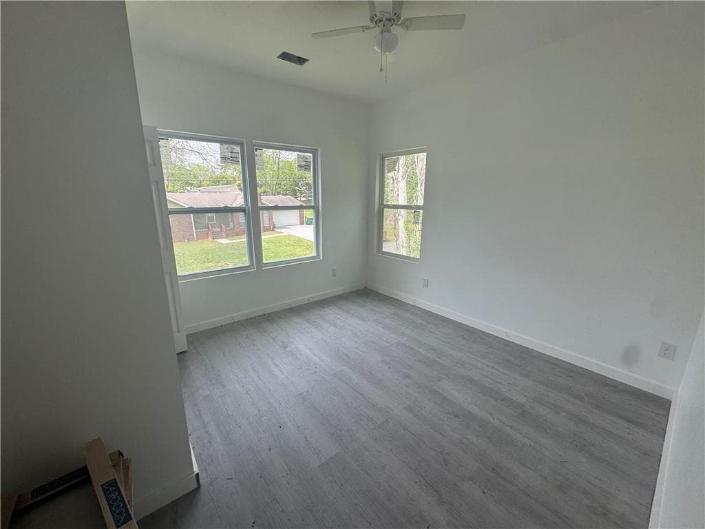 4 bedroom, 3 bathroom, 1,654 sq ft single family residence for sale at 6895 Magnolia Street, Lithonia, GA 30058 — photo 9