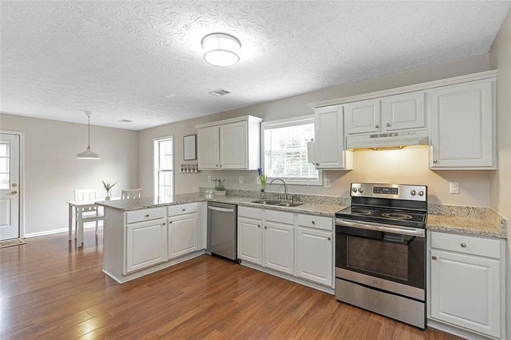5 bedroom, 3 bathroom, 2,688 sq ft single family residence for sale at 1196 Adah Court, Lawrenceville, GA 30043 — photo 6