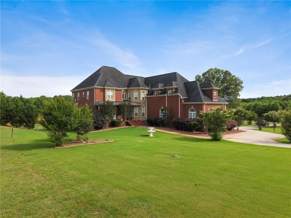 6 bedroom, 5 bathroom, 6,138 sq ft single family residence for sale at 345 River Cove Meadows, Social Circle, GA 30025