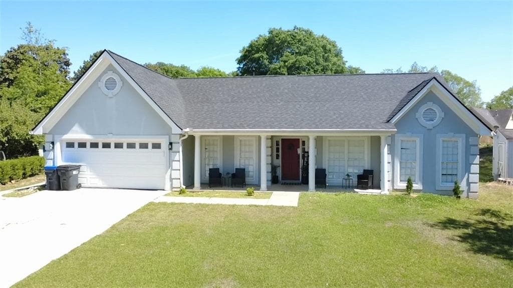 5 bedroom, 2 bathroom, 2,010 sq ft single family residence for sale at 2118 Blue Martin Court, Lawrenceville, GA 30044 — photo 3