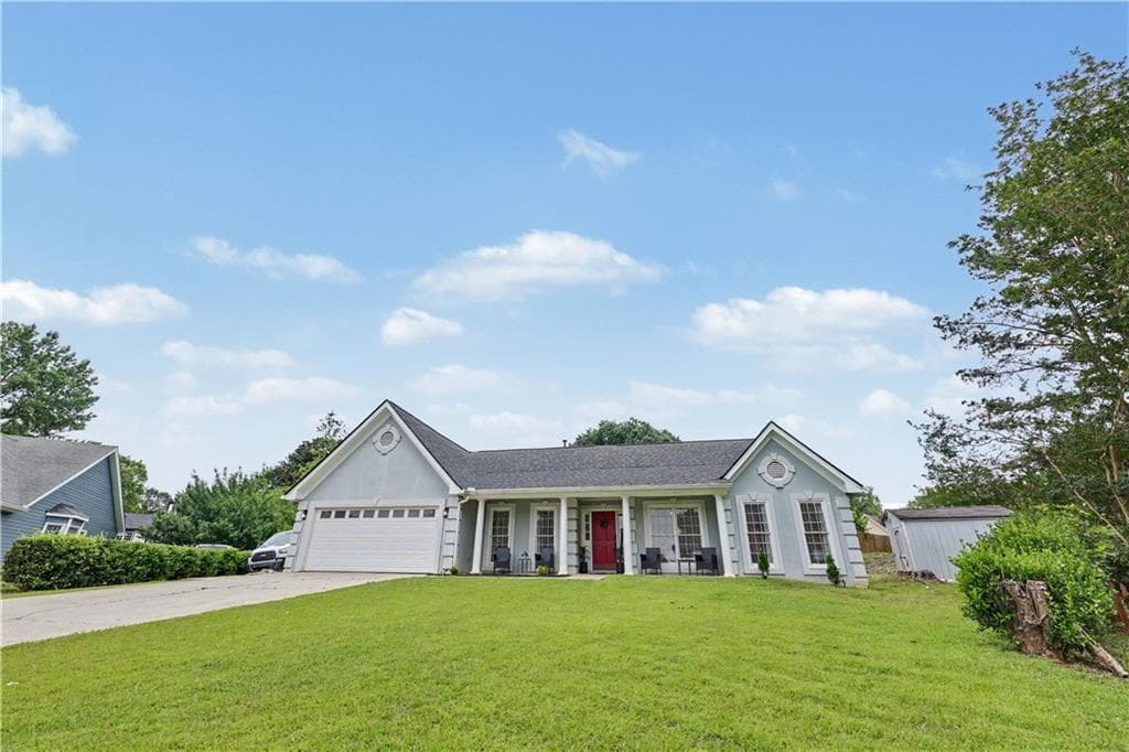 5 bedroom, 2 bathroom, 2,010 sq ft single family residence for sale at 2118 Blue Martin Court, Lawrenceville, GA 30044 — photo 4