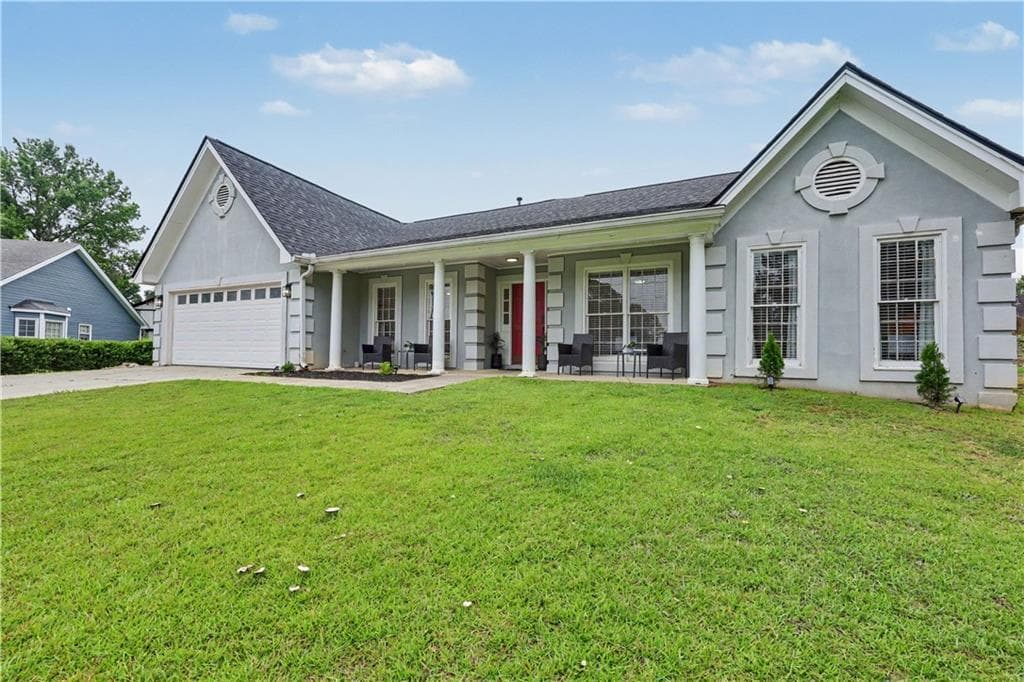 5 bedroom, 2 bathroom, 2,010 sq ft single family residence for sale at 2118 Blue Martin Court, Lawrenceville, GA 30044 — photo 5