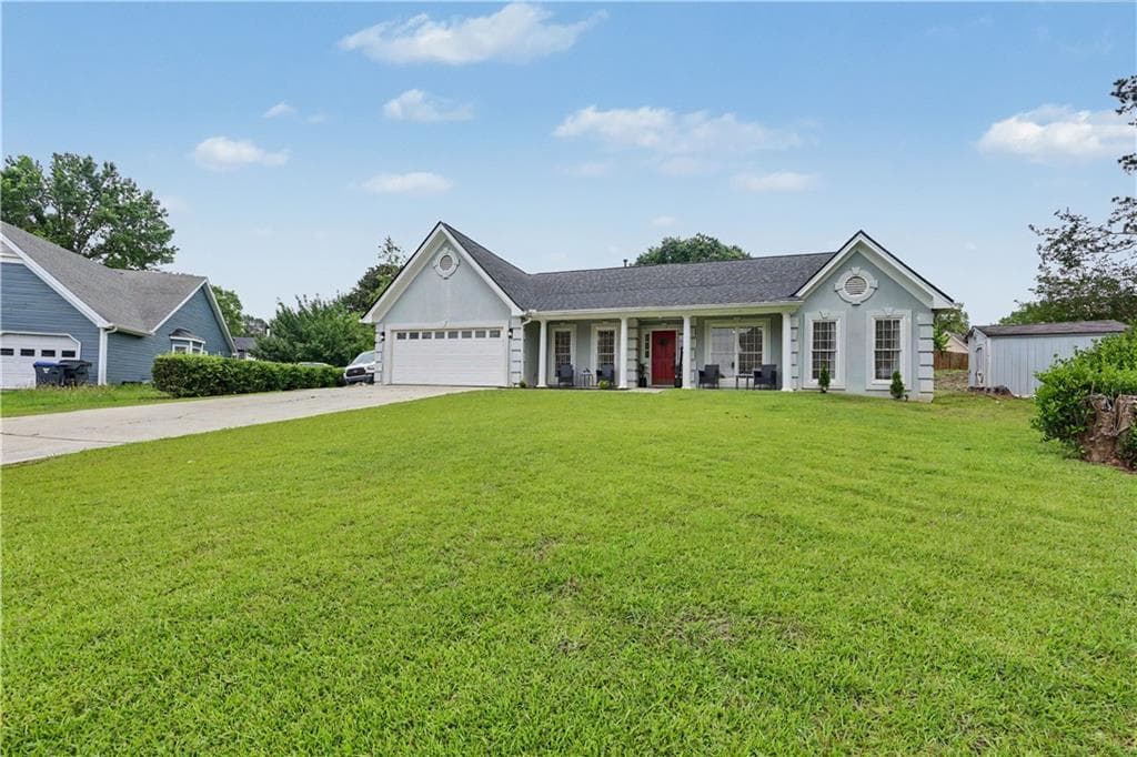 5 bedroom, 2 bathroom, 2,010 sq ft single family residence for sale at 2118 Blue Martin Court, Lawrenceville, GA 30044 — photo 7