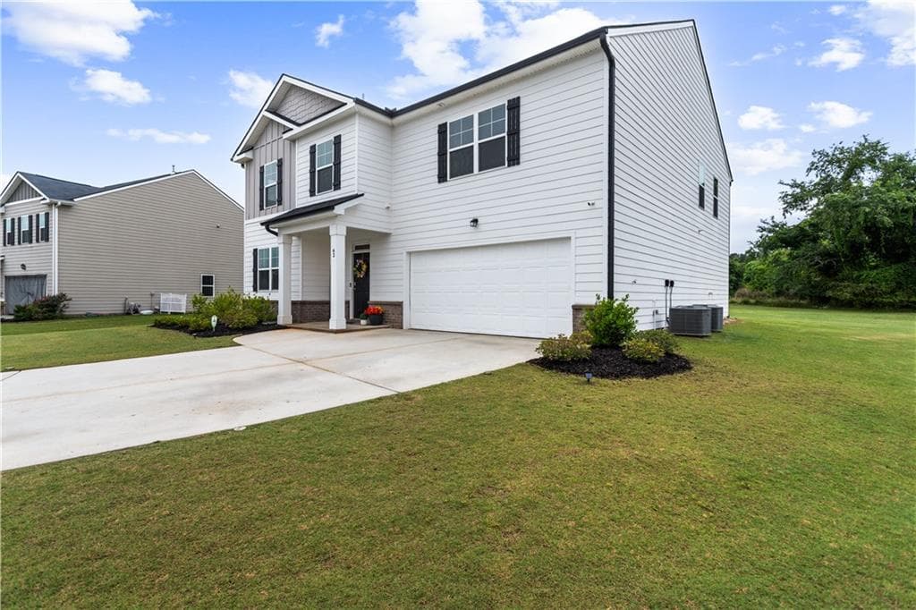 5 bedroom, 3 bathroom, 3,199 sq ft single family residence for sale at 62 Aaron Trail, Dacula, GA 30019 — photo 2