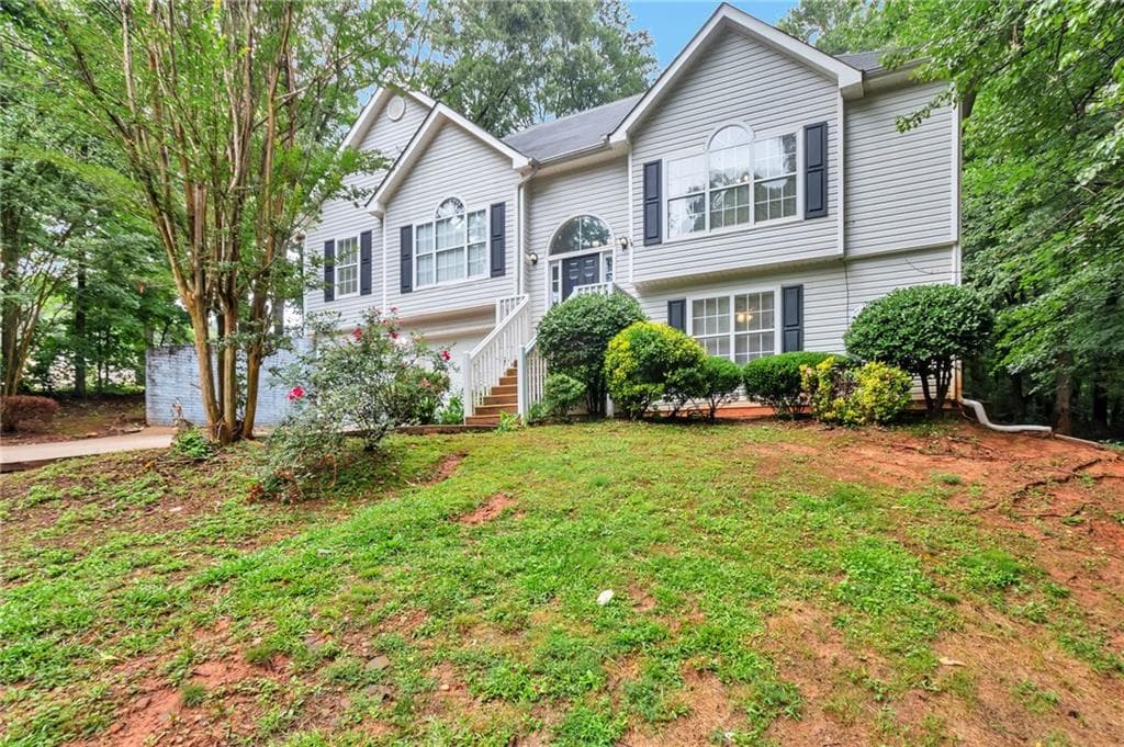 4 bedroom, 3 bathroom, 1,774 sq ft single family residence for sale at 4374 Northridge Trail, Ellenwood, GA 30294 — photo 2