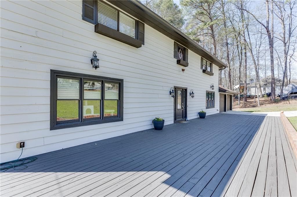 4 bedroom, 3 bathroom, 3,971 sq ft single family residence for sale at 5984 Dolvin Lane, Buford, GA 30518 — photo 5