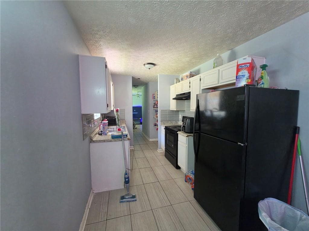 3 bedroom, 2 bathroom, 1,410 sq ft single family residence for sale at 2835 Sapphire Street, Atlanta, GA 30349 — photo 3