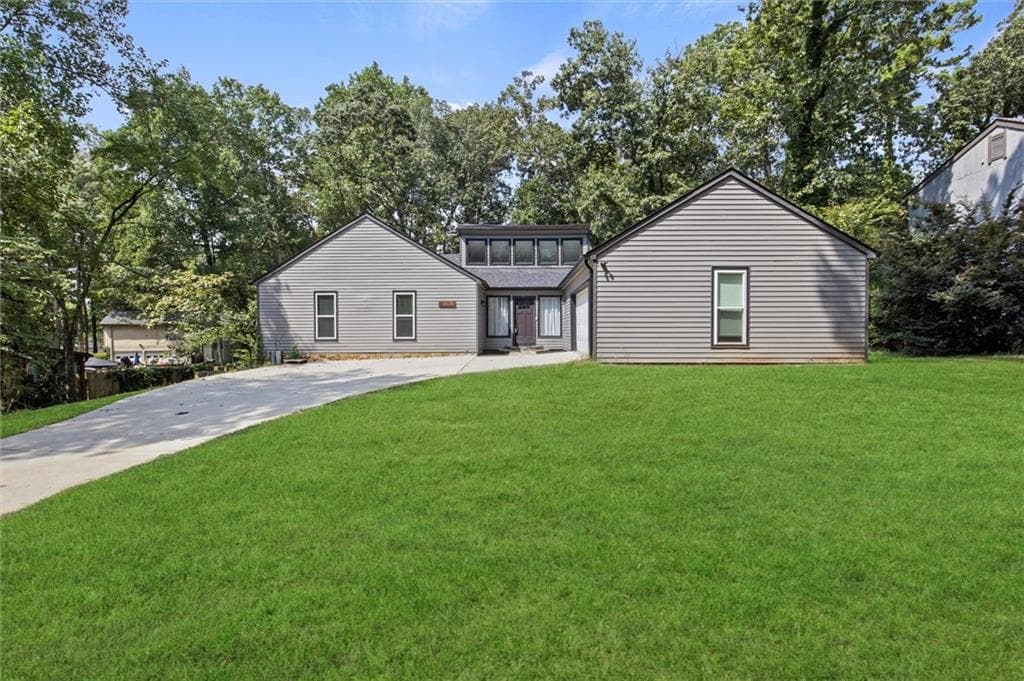 4 bedroom, 3 bathroom, 3,608 sq ft single family residence for sale at 1060 Deer Chase Court, Stone Mountain, GA 30088