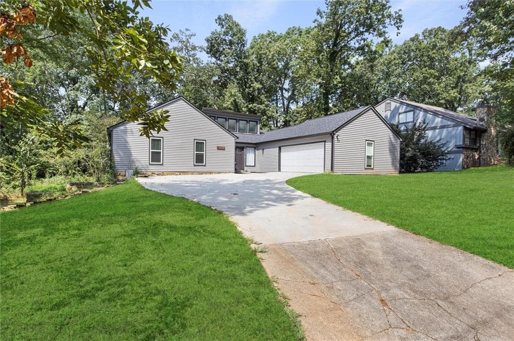 4 bedroom, 3 bathroom, 3,608 sq ft single family residence for sale at 1060 Deer Chase Court, Stone Mountain, GA 30088 — photo 3