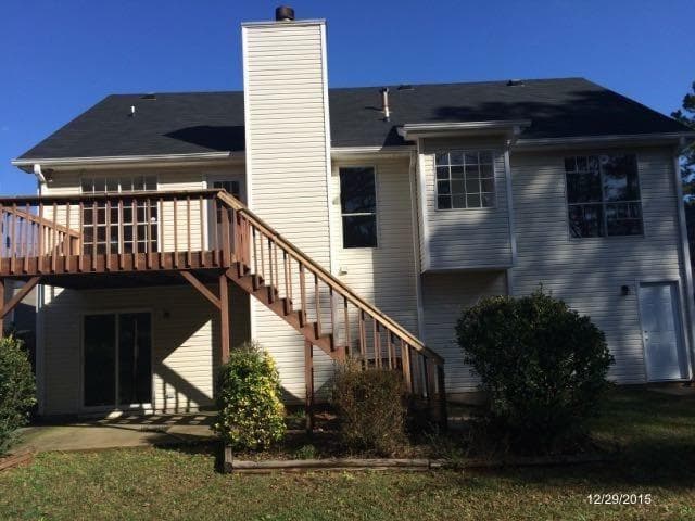 4 bedroom, 3 bathroom, 2,380 sq ft single family residence for sale at 1965 Phillips Lake Bluff, Lithonia, GA 30058 — photo 2