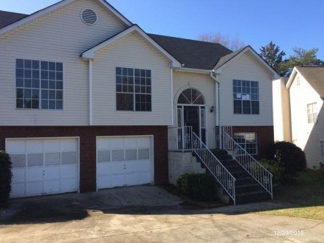 4 bedroom, 3 bathroom, 2,380 sq ft single family residence for sale at 1965 Phillips Lake Bluff, Lithonia, GA 30058 — photo 4