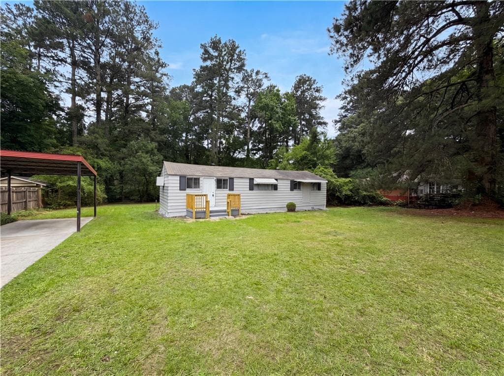 3 bedroom, 1 bathroom, 752 sq ft single family residence for sale at 1396 Pine Drive, Atlanta, GA 30349 — photo 2