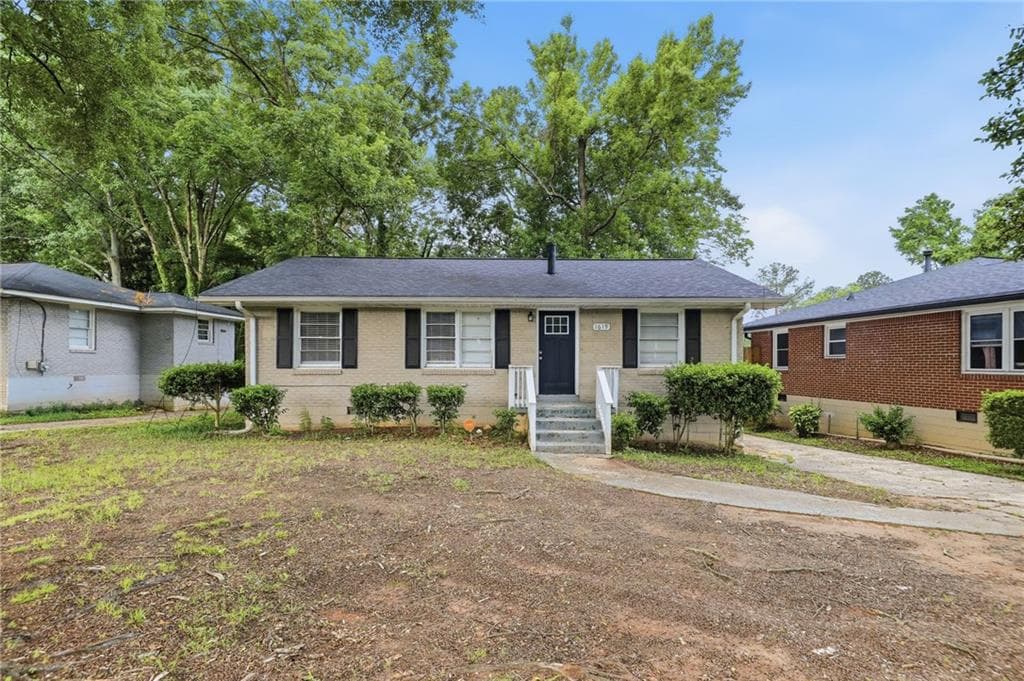 3 bedroom, 1 bathroom, 988 sq ft single family residence for sale at 1619 Columbia Drive, Decatur, GA 30032 — photo 2
