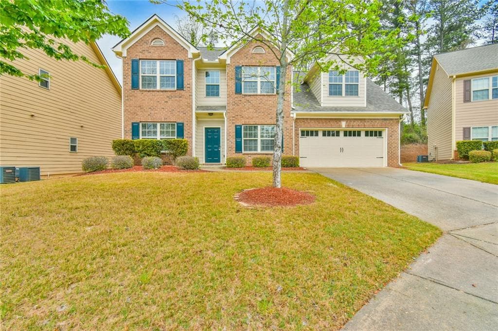 4 bedroom, 3 bathroom, 2,302 sq ft single family residence for sale at 3633 Fallen Oak Drive, Buford, GA 30519 — photo 1 of 30