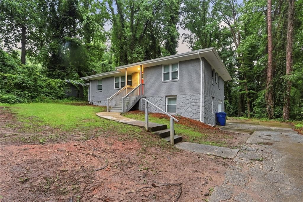 4 bedroom, 3 bathroom, 1,740 sq ft single family residence for sale at 3896 Rux Road, Atlanta, GA 30331 — photo 4