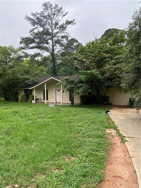 3 bedroom, 2 bathroom, 1,526 sq ft single family residence for sale at 2023 Wellborn Road, Lithonia, GA 30058