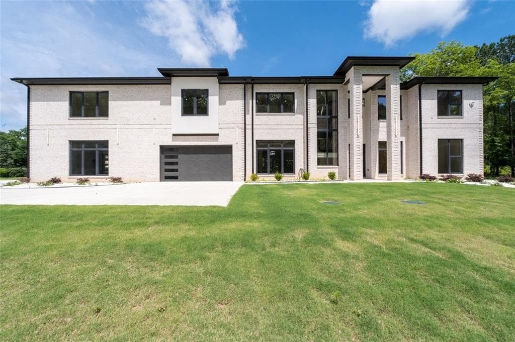 4 bedroom, 5 bathroom, 5,285 sq ft single family residence for sale at 1939 Sunny Hill Road, Lawrenceville, GA 30043