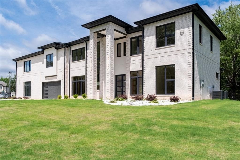 4 bedroom, 5 bathroom, 5,285 sq ft single family residence for sale at 1939 Sunny Hill Road, Lawrenceville, GA 30043 — photo 2