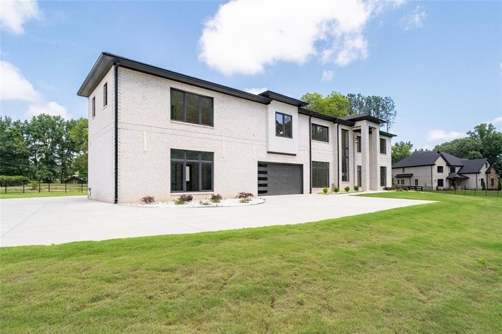 4 bedroom, 5 bathroom, 5,285 sq ft single family residence for sale at 1939 Sunny Hill Road, Lawrenceville, GA 30043 — photo 5