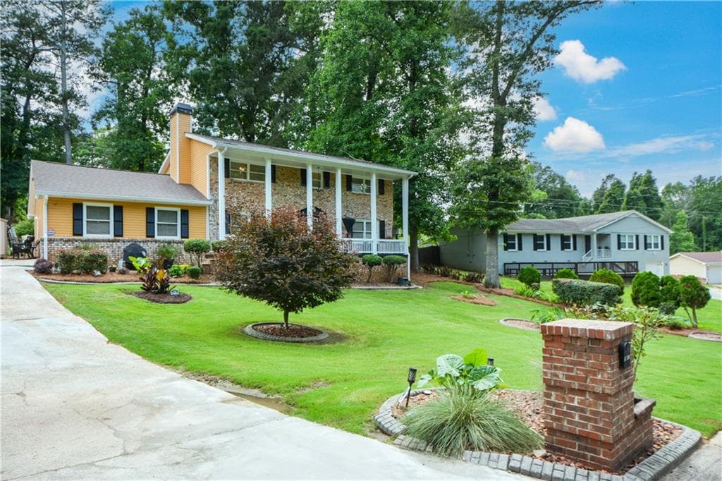 4 bedroom, 3 bathroom, 2,320 sq ft single family residence for sale at 7461 Page Court, Jonesboro, GA 30236 — photo 2