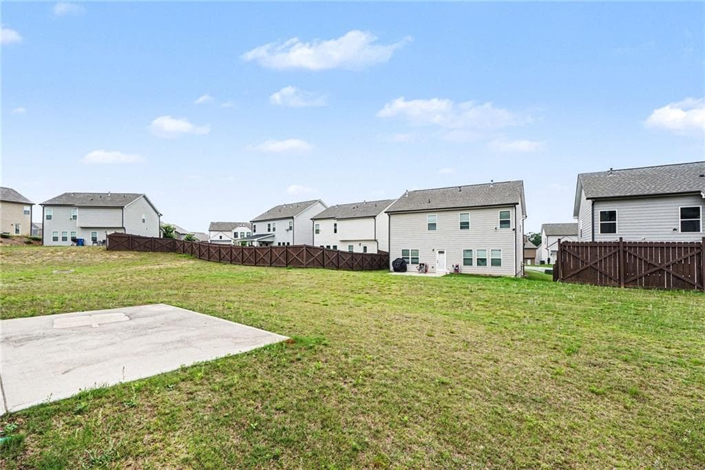 4 bedroom, 3 bathroom, 2,578 sq ft single family residence for sale at 612 Auburn Crossing Drive, Auburn, GA 30011 — photo 6