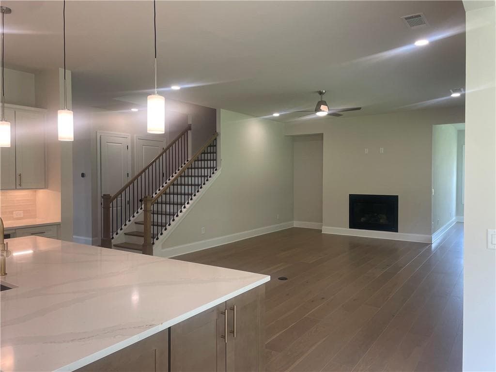 5 bedroom, 5 bathroom, 3,982 sq ft single family residence for sale at 7150 Pond View Drive, Cumming, GA 30028 — photo 3