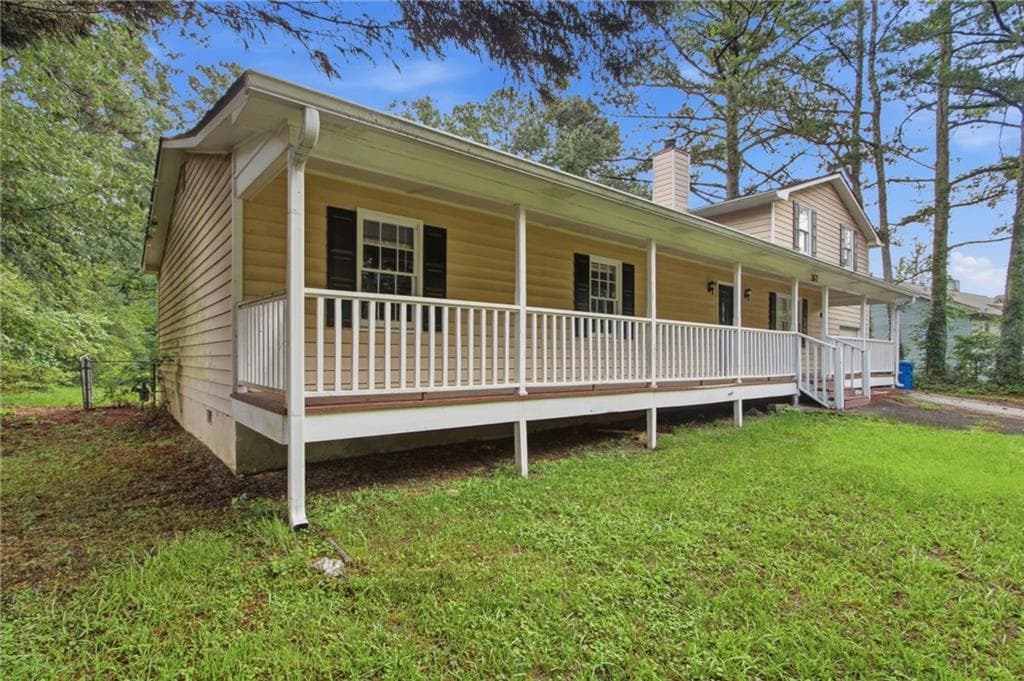 4 bedroom, 3 bathroom, 2,240 sq ft single family residence for sale at 2671 Pine Log Way, Buford, GA 30519 — photo 2