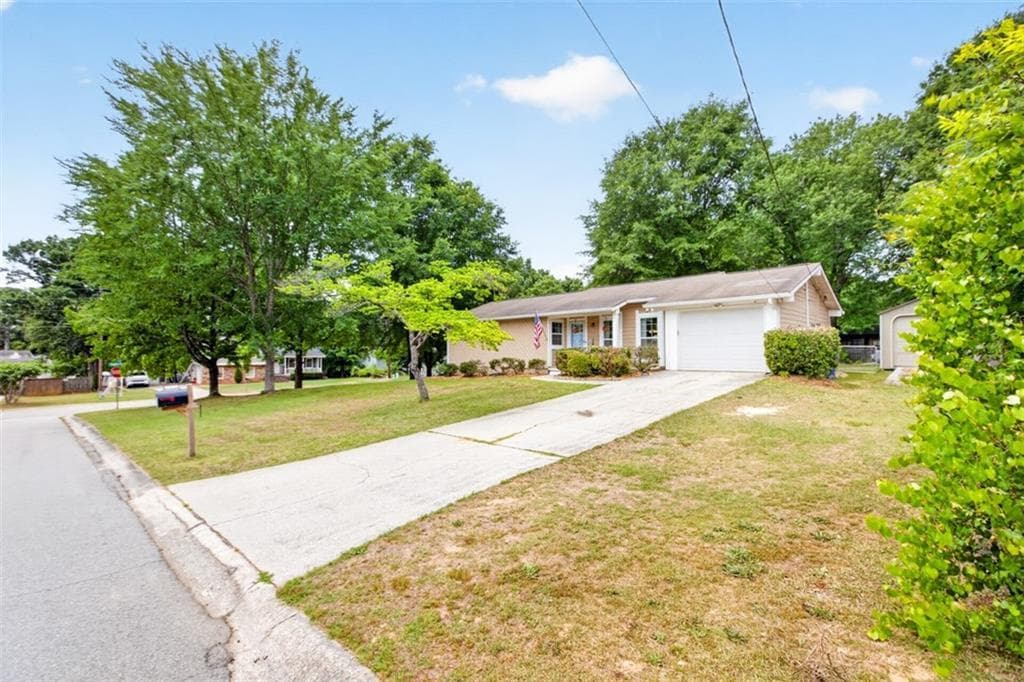 3 bedroom, 2 bathroom, 1,333 sq ft single family residence for sale at 1783 Riverridge Drive, Conyers, GA 30012 — photo 2