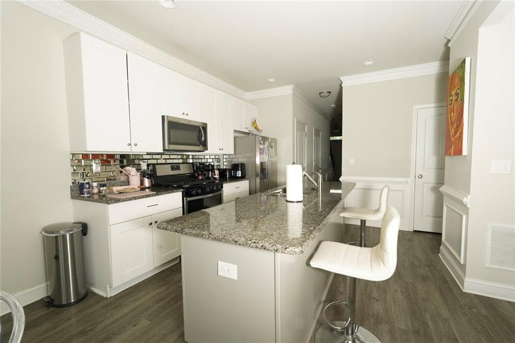 4 bedroom, 3 bathroom, 2,199 sq ft single family residence for sale at 5248 Halcyon Court, Morrow, GA 30260 — photo 8