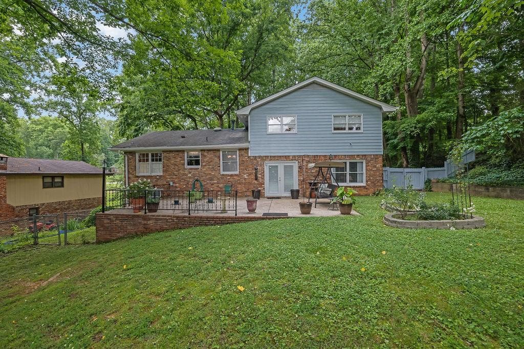 4 bedroom, 3 bathroom, 2,080 sq ft single family residence for sale at 4916 Oak Grove Drive, Buford, GA 30518 — photo 2