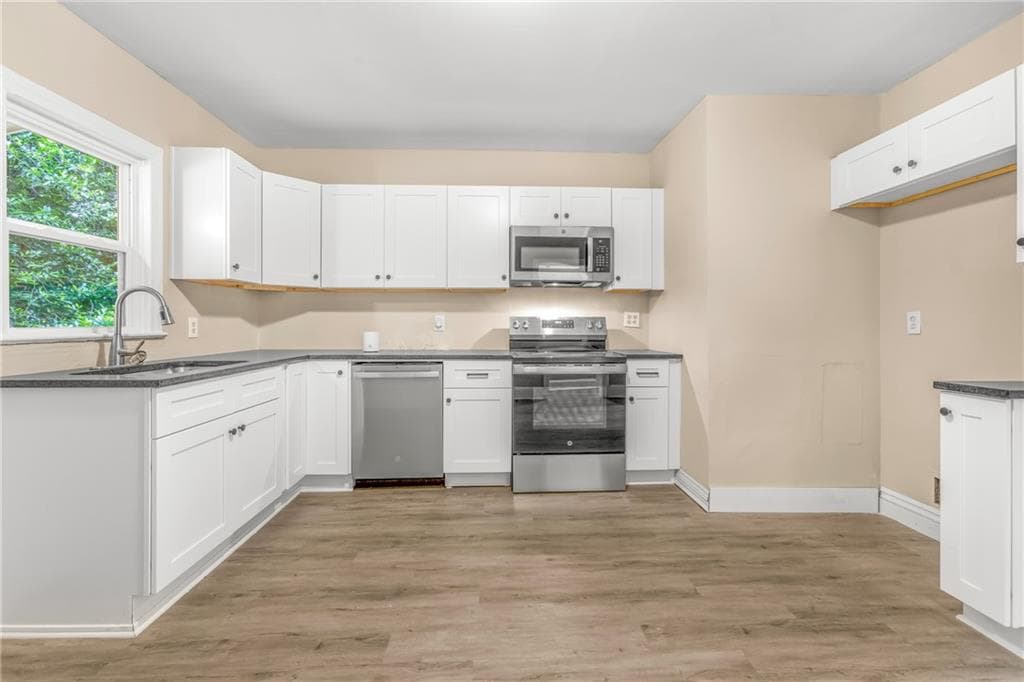 3 bedroom, 1 bathroom, 1,160 sq ft single family residence for sale at 1826 E Farris Avenue, Atlanta, GA 30344 — photo 7