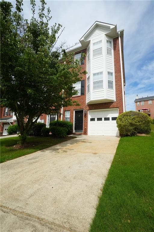 3 bedroom, 4 bathroom, 1,698 sq ft townhouse for sale at 2164 Mill Garden Run, Buford, GA 30519 — photo 2