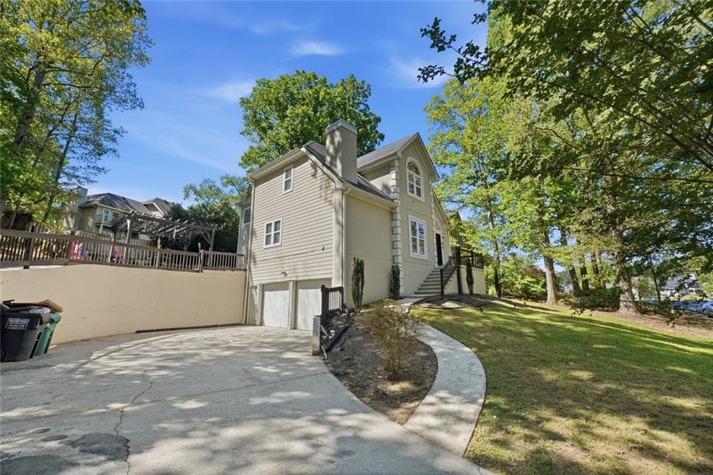 4 bedroom, 4 bathroom, 4,958 sq ft single family residence for sale at 4100 Na Ah Tee Trail, Snellville, GA 30039 — photo 4