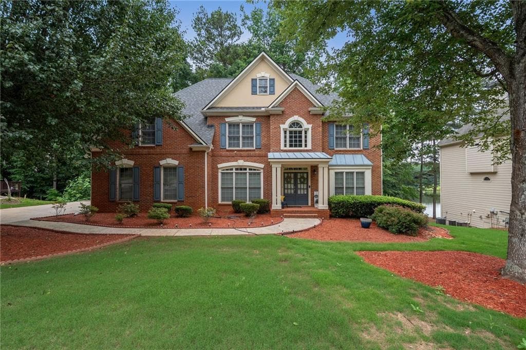 6 bedroom, 5 bathroom, 4,983 sq ft single family residence for sale at 7220 Glen Cove Lane, Stone Mountain, GA 30087 — photo 2