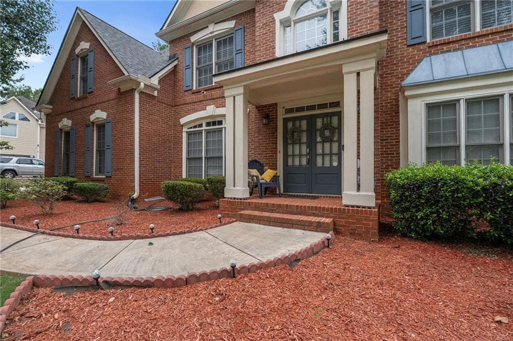 6 bedroom, 5 bathroom, 4,983 sq ft single family residence for sale at 7220 Glen Cove Lane, Stone Mountain, GA 30087 — photo 4