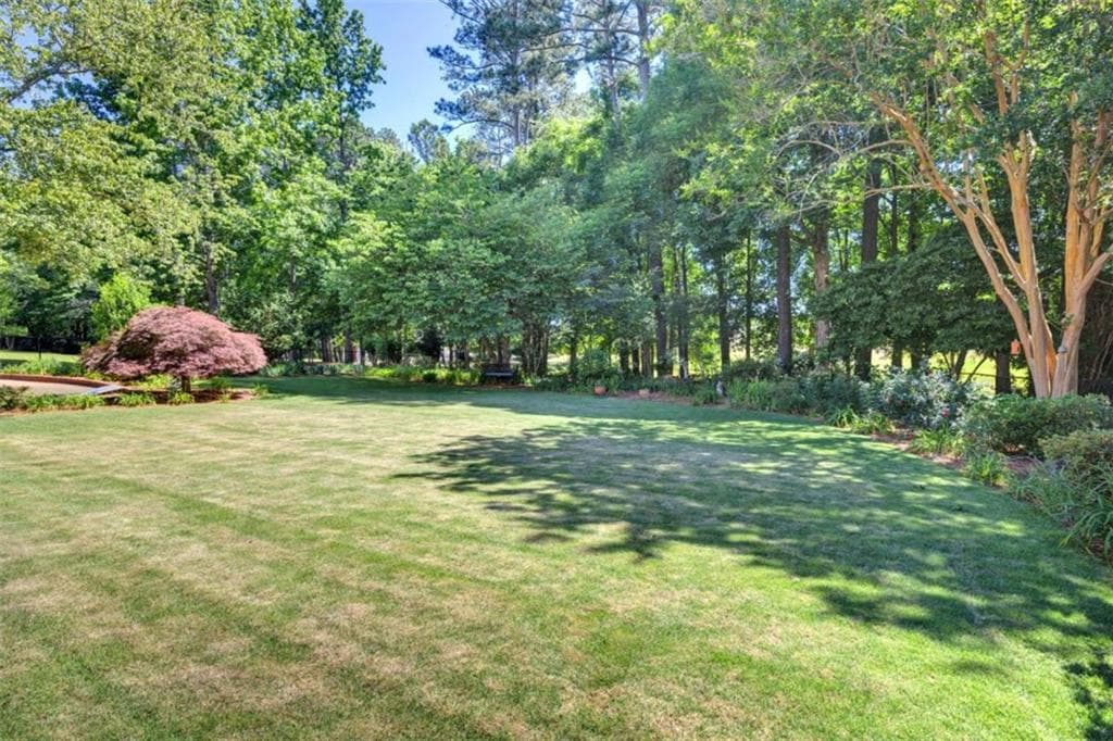 5 bedroom, 4 bathroom, 5,401 sq ft single family residence under contract at 7157 S Dearing Street, Covington, GA 30014 — photo 10