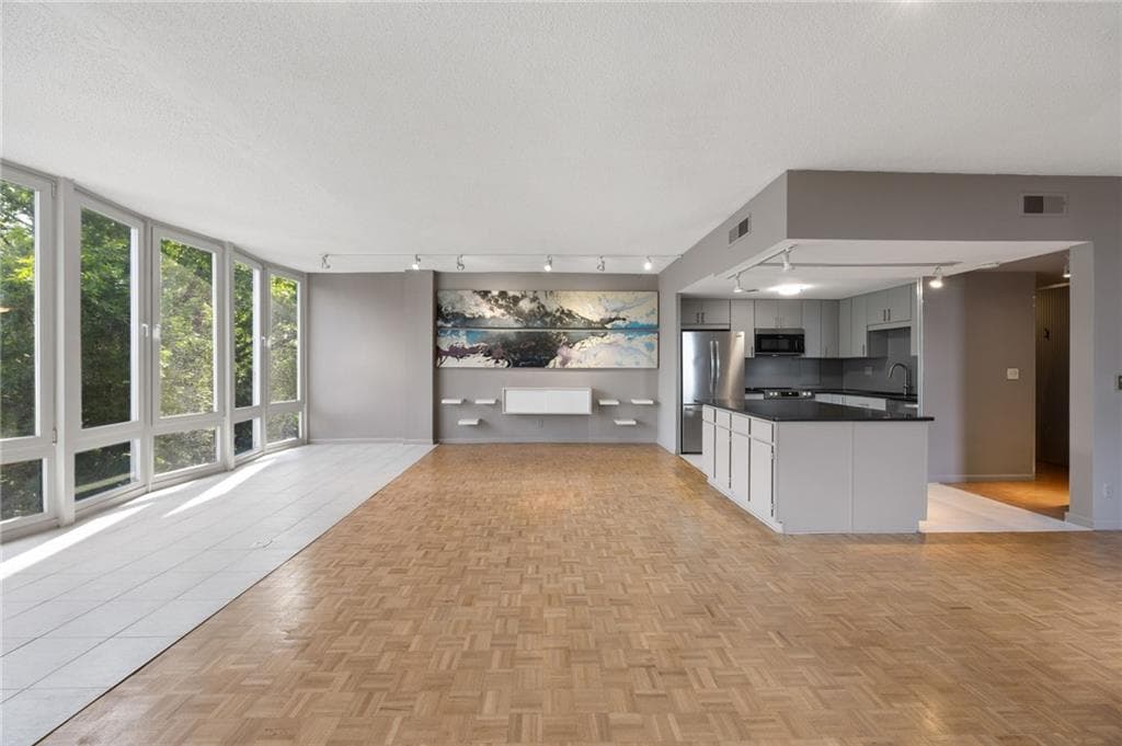 3 bedroom, 2 bathroom, 1,523 sq ft condominium for sale at 3060 Pharr Court 615, Atlanta, GA 30305 — photo 1 of 42