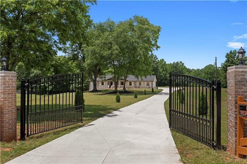 5 bedroom, 3 bathroom, 3,200 sq ft single family residence for rent at 5245 Stonewall Tell Road, Atlanta, GA 30349 for $3,450 a month — photo 1 of 15