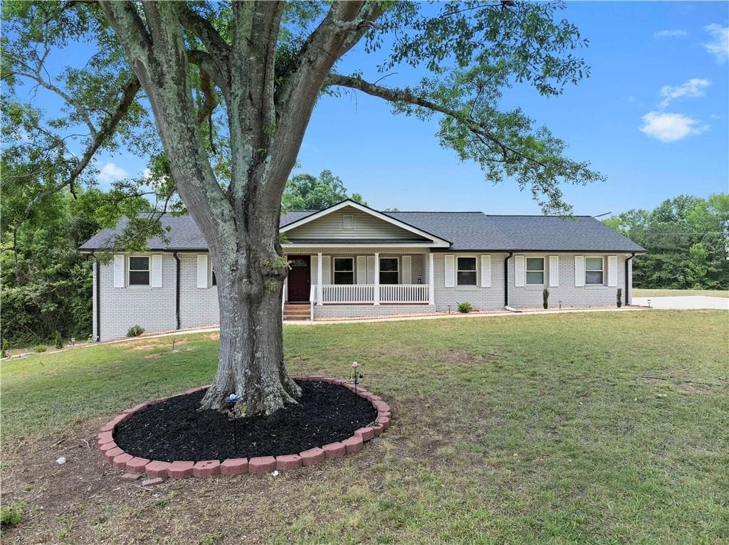 5 bedroom, 3 bathroom, 3,200 sq ft single family residence for rent at 5245 Stonewall Tell Road, Atlanta, GA 30349 for $3,450 a month — photo 2